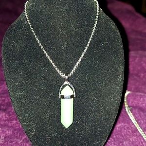 Crystal necklace with light green stone on 11in chain.
